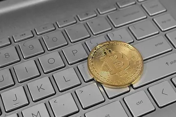 Bitcoin on a laptop